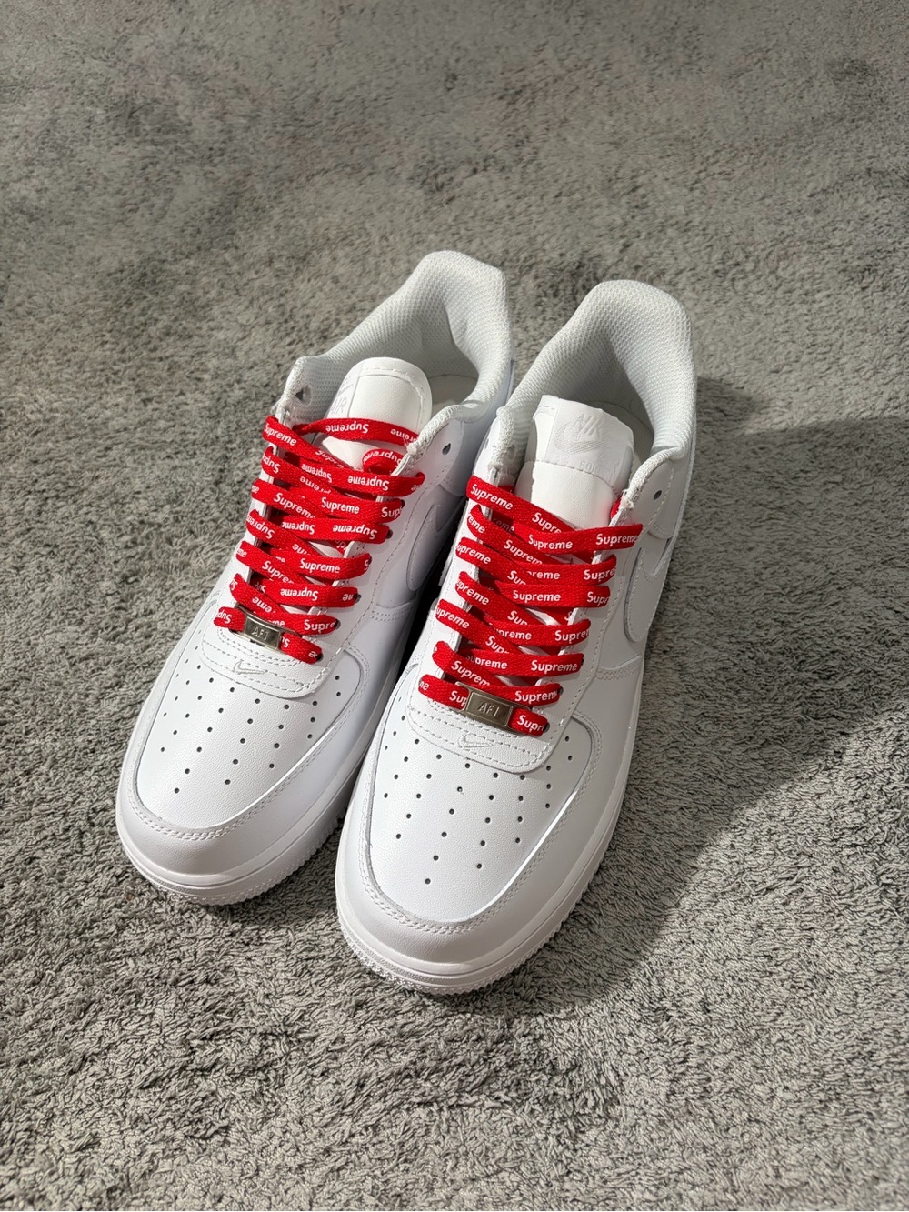 Nike White Low-Top Sneakers with Red Supreme Laces